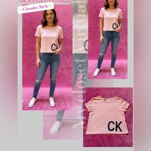 Calvin Klein Pink Logo Cropped Tee with Blue Skinny Jeans
